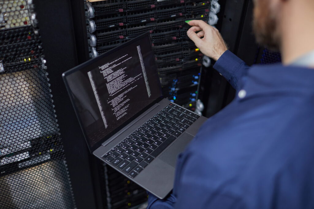 It Technician from an IT company working in a server Room